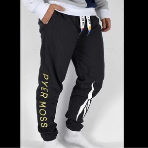 Pyer Moss Black Joggers with Yellow Logo and White Graphic